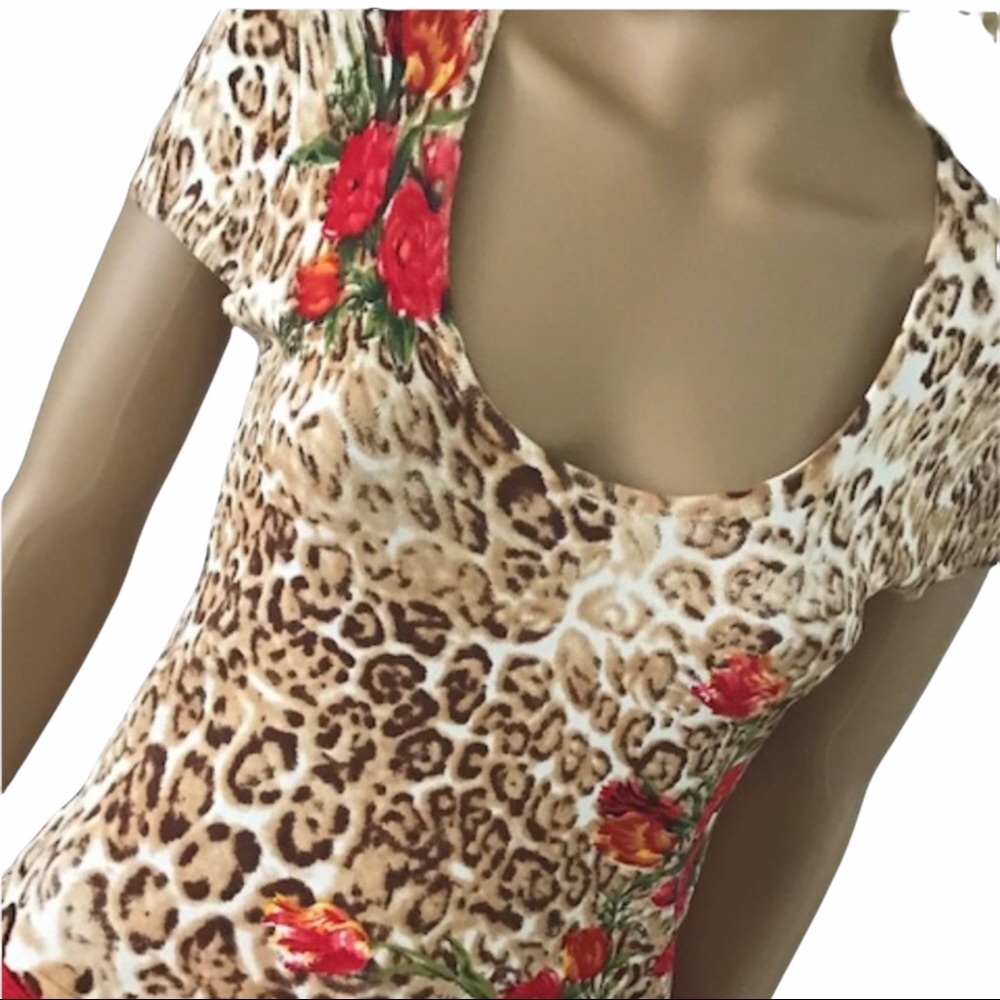 RED floral accents on animal print knit top